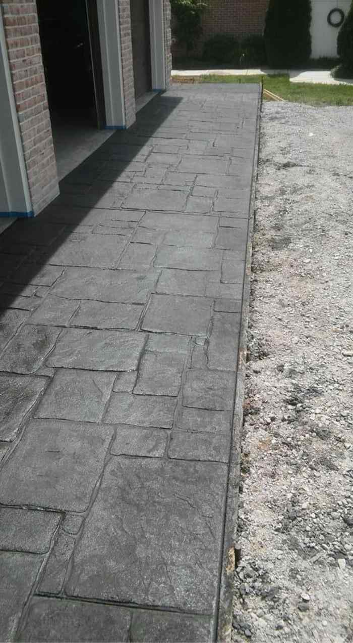 Stamped concrete walkway in ashlar slate pattern