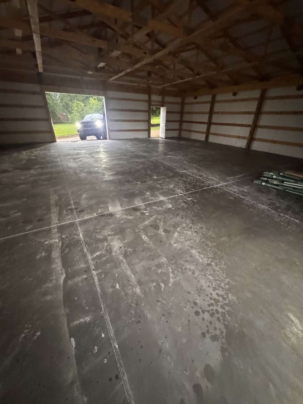 Finished smooth concrete floor inside a pole barn