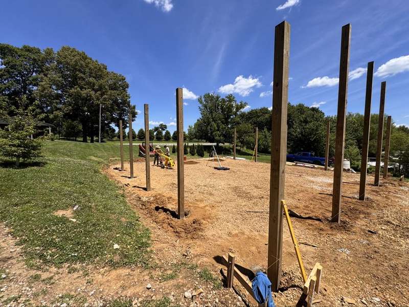 Wooden posts set for pole barn framing