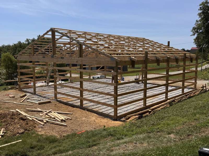 Completed wooden frame with roof trusses