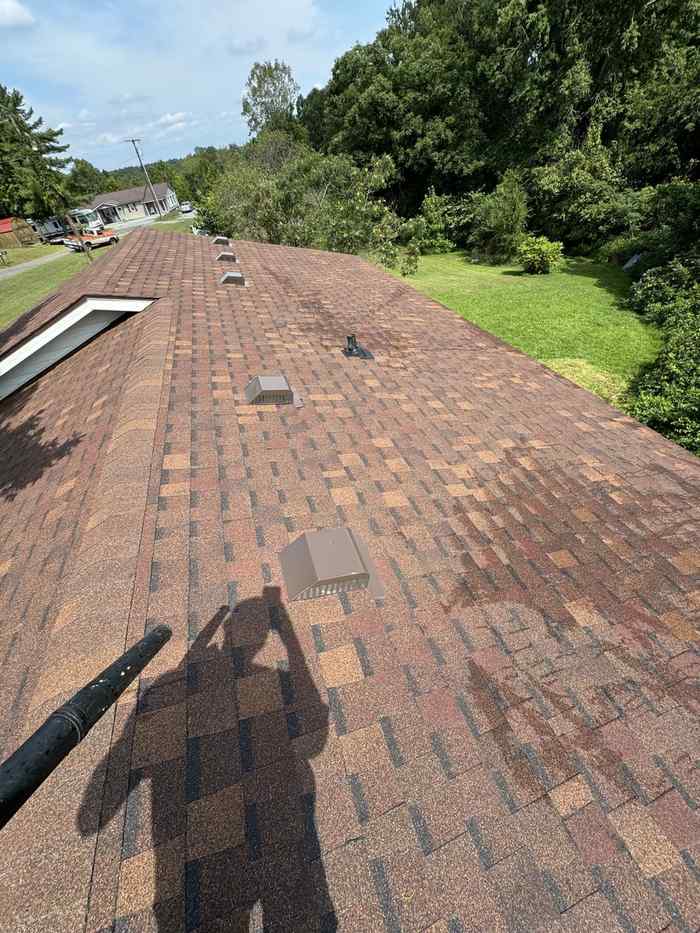 Finished shingle roof after cleanup