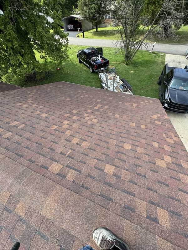 Finished shingle roof viewed from above