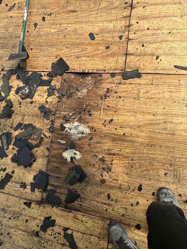 Old shingles stripped during tear-off