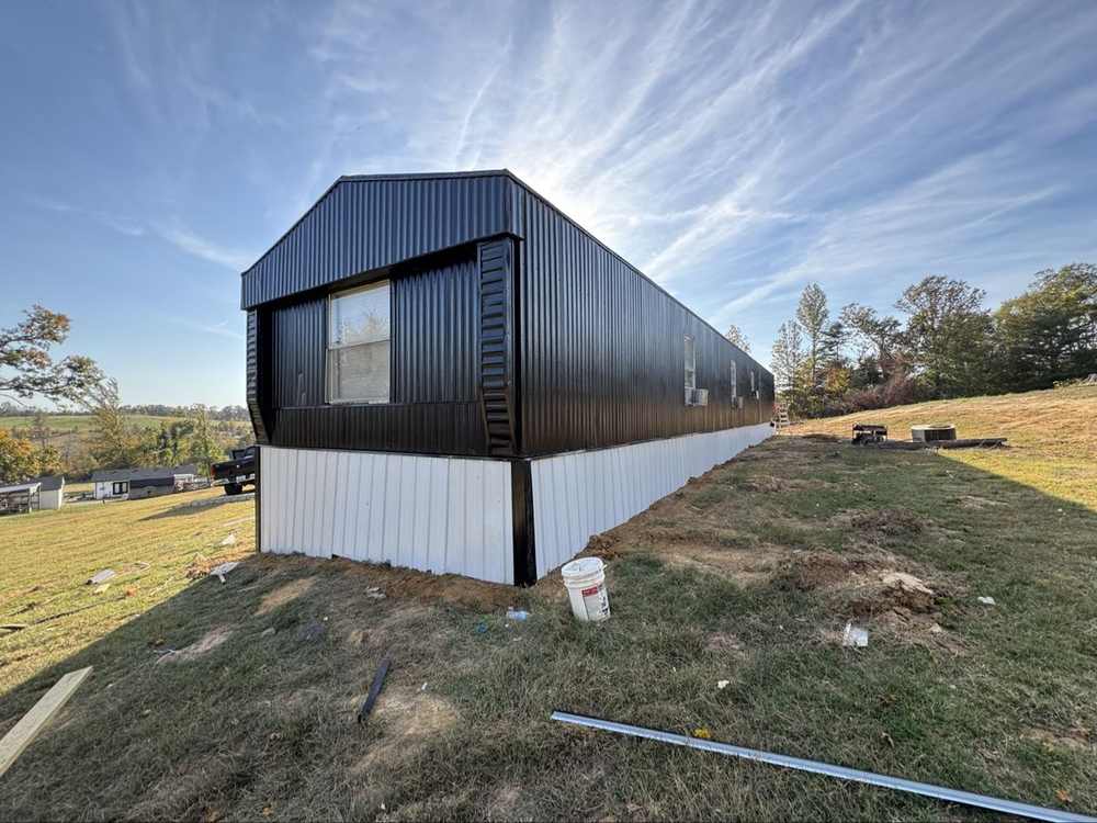 Finished black and white siding, end view